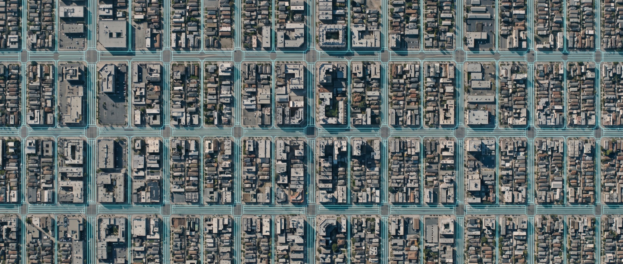 Aerial view of a city street grid at dusk